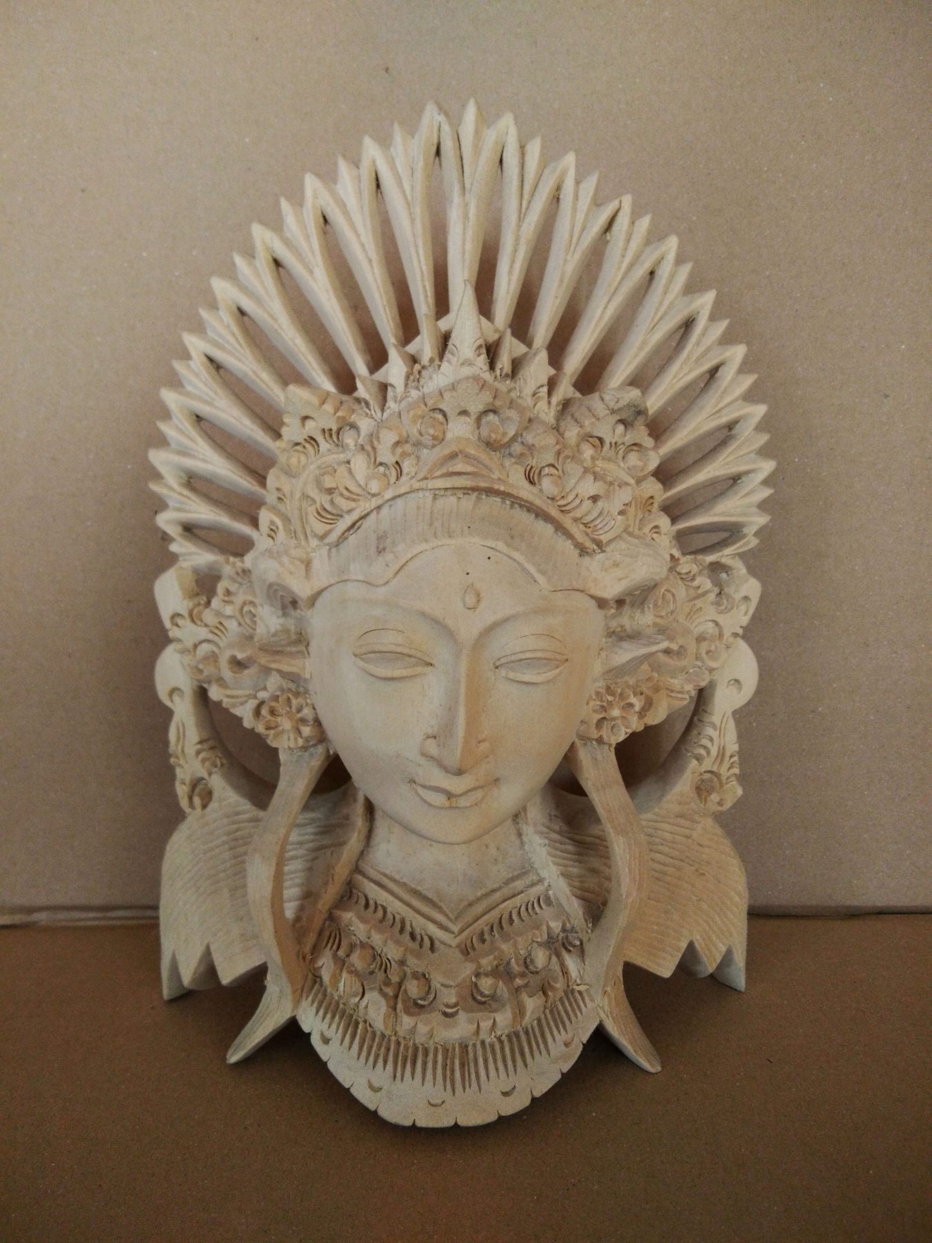 Hand-carved wooden figure of a Balinese dancer